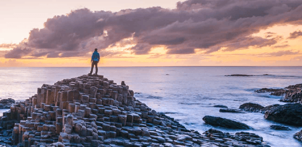 Hiker looking out to sea