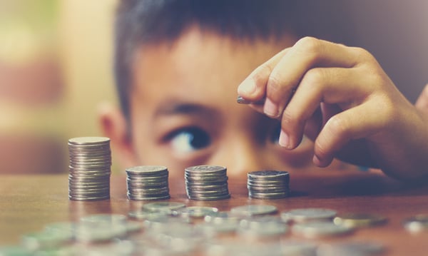 780-x-467-boy-and-coins.jpg