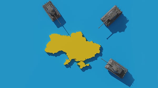 Russian tanks pointing at map of Ukraine